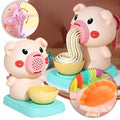  Gourmet play dough Toy pig with a bowl and a toy dumpling.