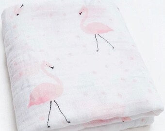 Folded fabric with pink flamingo pattern Two layers muslin gauze baby  blanket plush-hug quilt blanket muslin baby blankets.