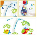 Set of colorful baby toys including a ball, rattle, and teether 