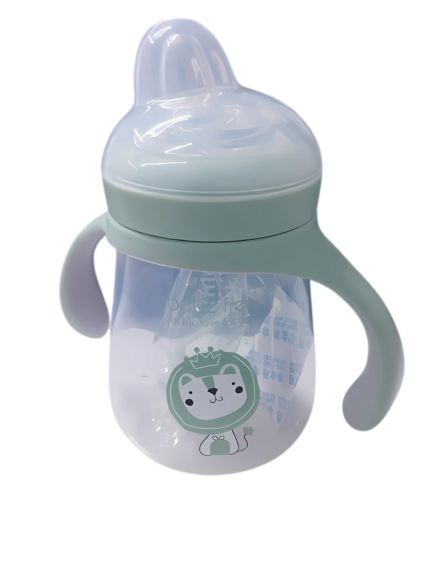 Baby bottle with handle and green lid .