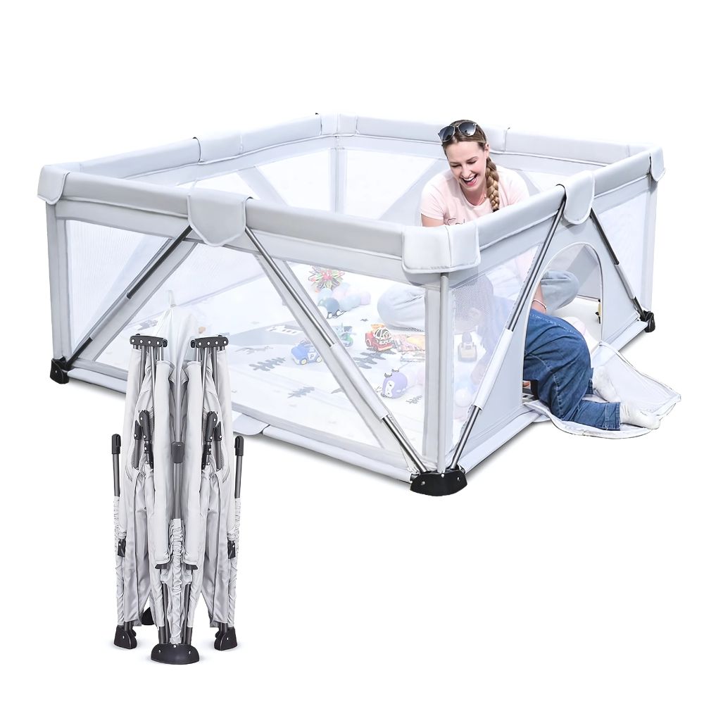 White playpen with a child inside .