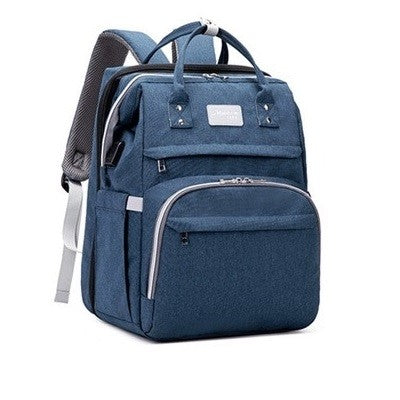 Blue diaper backpack with multiple pockets
