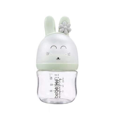 Clear bottle with a green bunny-shaped cap .
