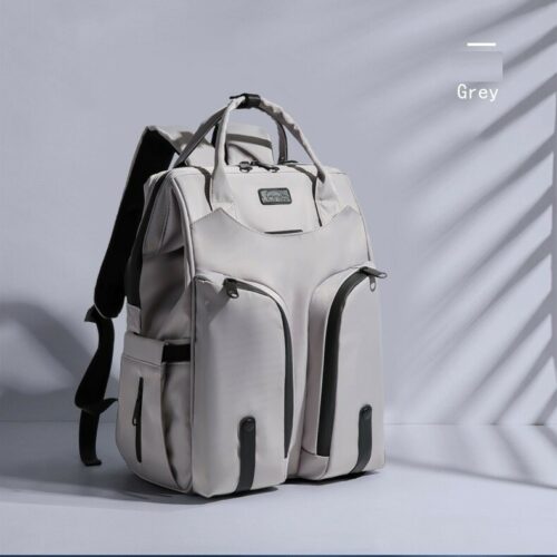 Gray backpack waterproof mummy back bag for travel.