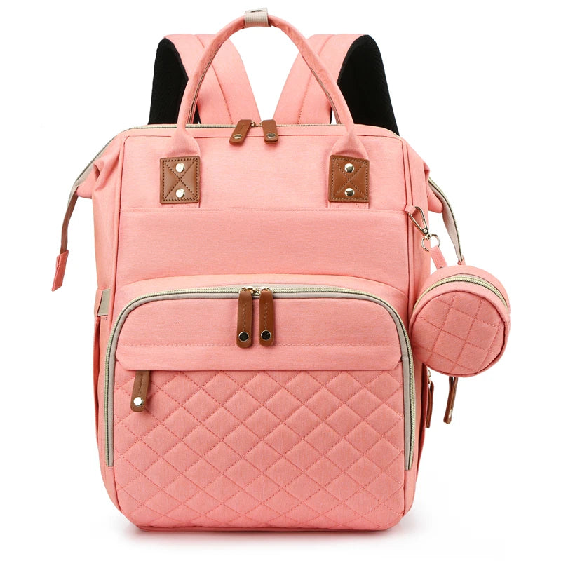 Pink quilted backpack with matching pouch 