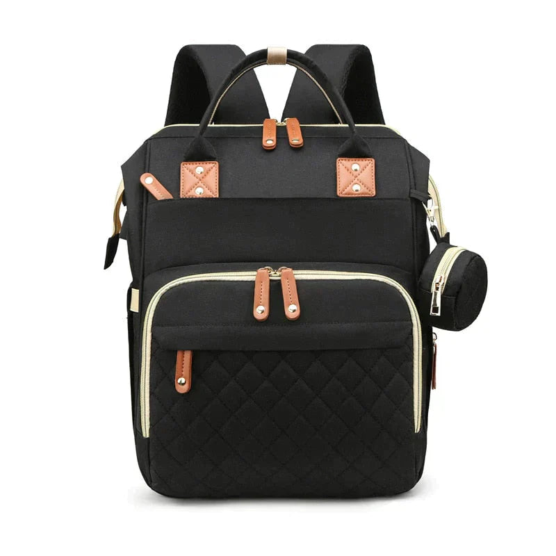 Black backpack with quilted design and brown accents.