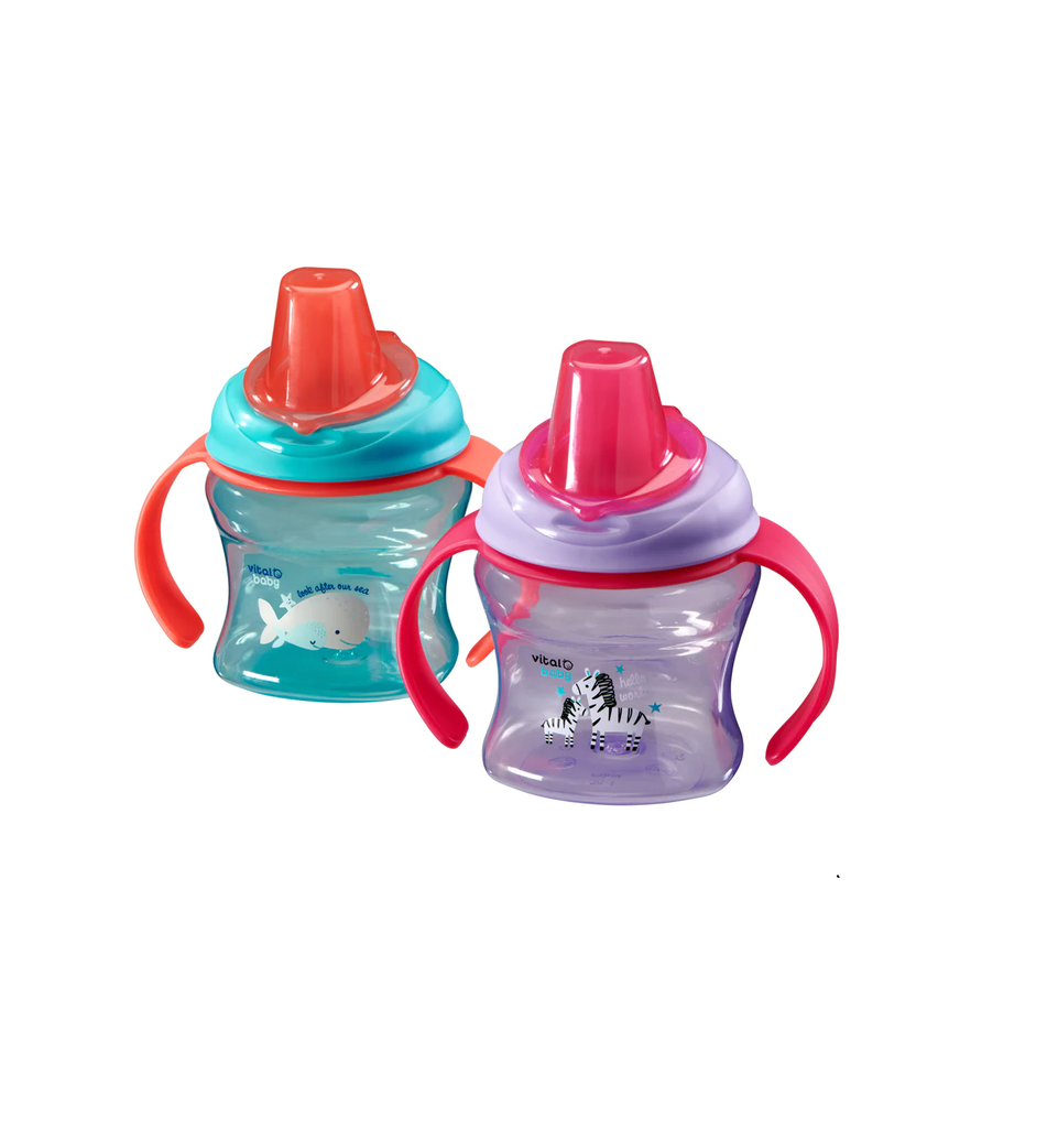 Two colorful sippy cups with handles .