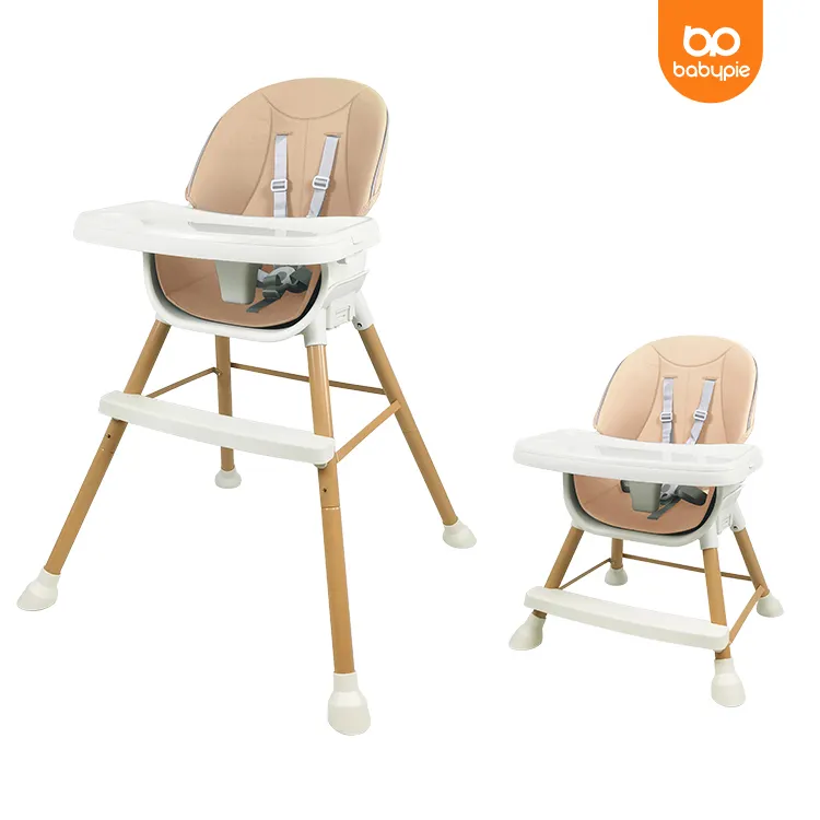 Beige and white wooden high chair with baby seat .