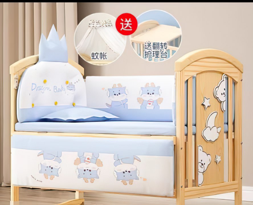 Children's crib with five piece bedding cartoon design and additional items