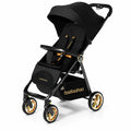 A black baby stroller with gold accents and  printed on the side.  Easy to fold lightweight stroller.