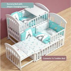 Nursery bed with diaper changing station converting to toddler bed .