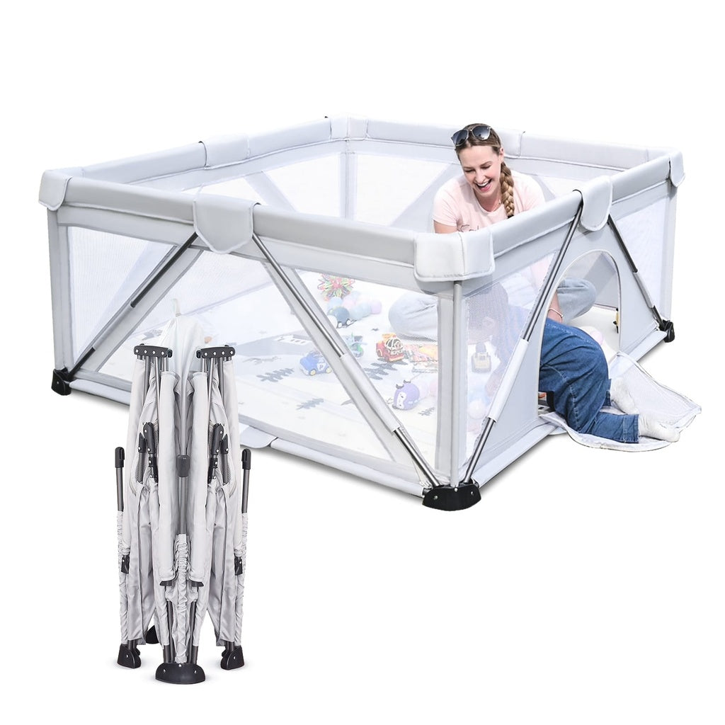 White playpen with a child inside .