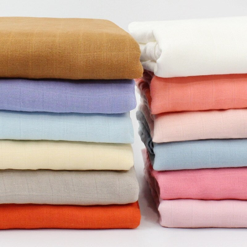Stacks of colorful fabric swatches 
