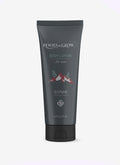 Body lotion tube labeled 'Roots & Glow' 