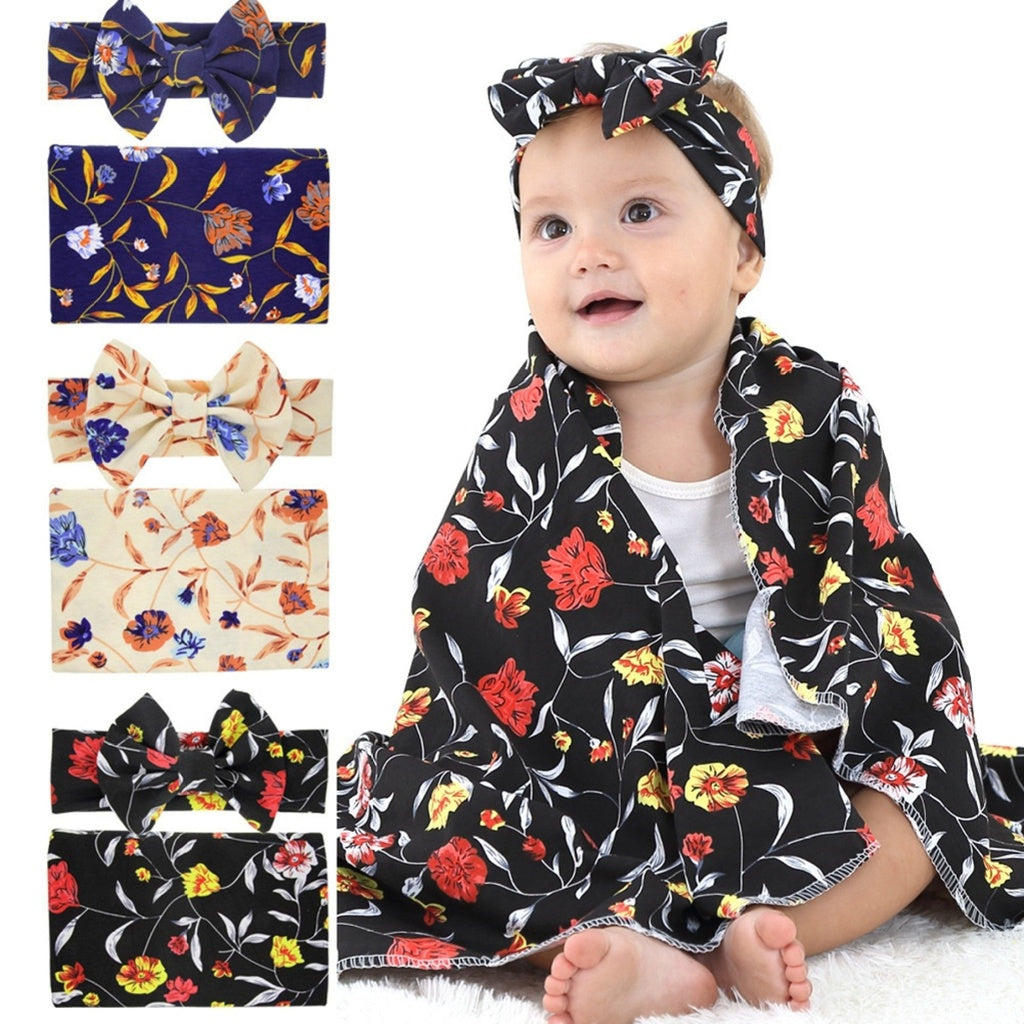 Baby wearing a floral headband and scarf with additional patterns displayed.