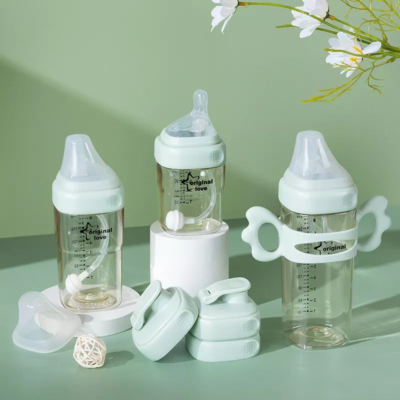 Set of baby bottles with accessories 