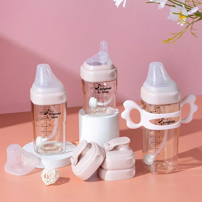 Set of baby bottles and accessories