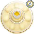  Calma  Solitaire Nipple shield with a clear plastic cover.