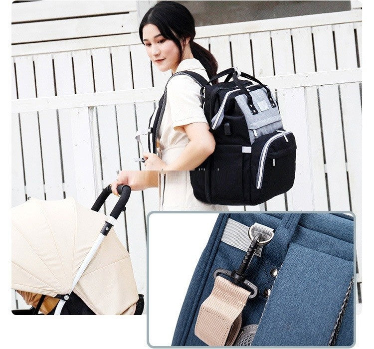 Woman with a black backpack holding a baby stroller, with close-up details of the backpack.