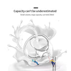 Glass container with milk splash and text about capacity of Double wearable breast pump.