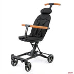 A convertible rider ll black stroller with a high-foam headrest, adjustable seat, and light brown wooden handlebar grips.