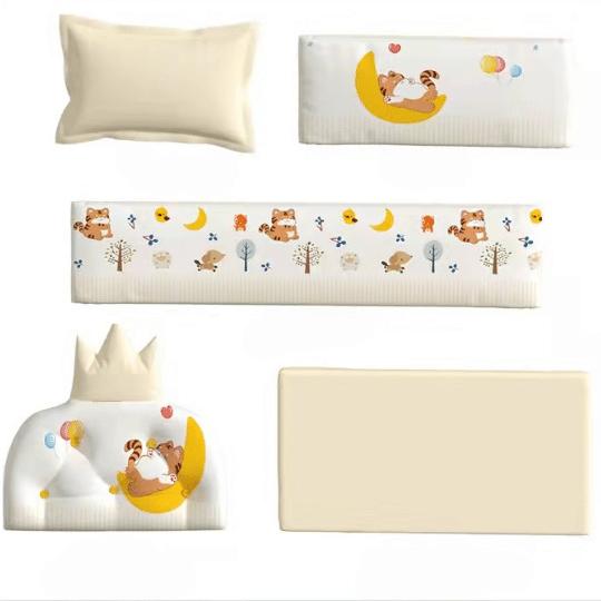 Collection of children's pillows and mattress with cartoon designs 