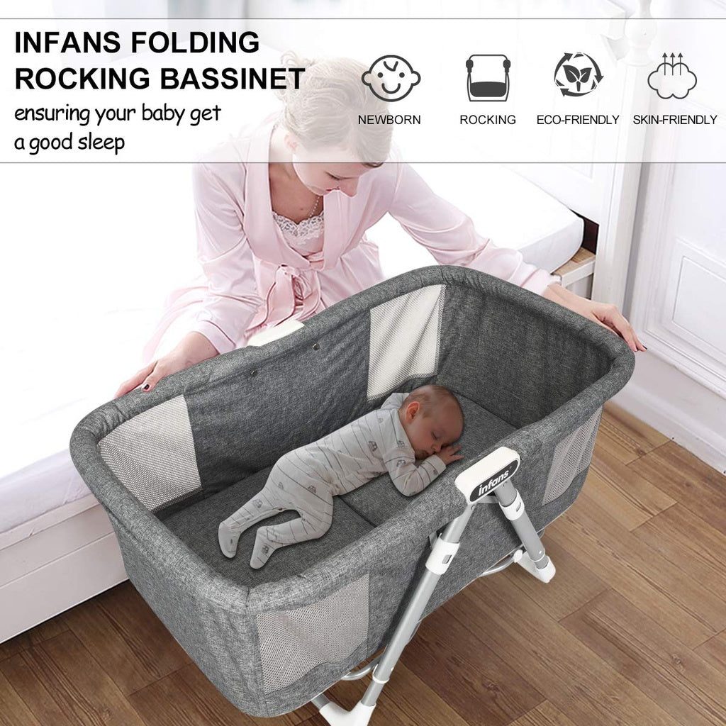 Infants folding rocking bassinet with baby sleeping, product features listed.
