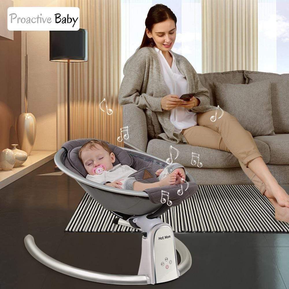 Baby sitting in a Hot Mom cotton Electric baby Swing