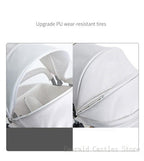 Close-up of a white Luxury Baby stroller with mesh design .