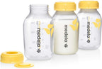 Three Medela breast milk storage bottles with yellow caps 