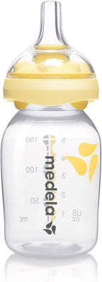 Medela baby bottle with yellow cap 