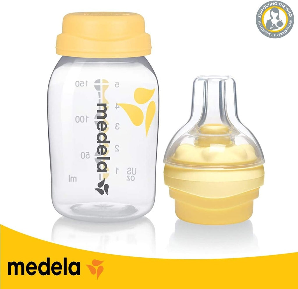 Medela baby bottle with yellow cap .