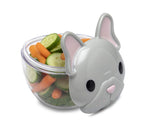 Melii Container shaped like a cat's face with sliced vegetables .