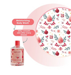 Bottle of moisturizing body wash with a decorative pink plate featuring pomegranate design.