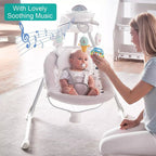 Baby in a white electric musical  baby bouncer with a woman holding a toy.