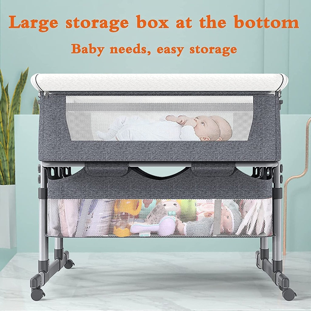 Portable crib with storage drawers.
