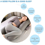 Woman using a gray inflatable pillow with features highlighted .
