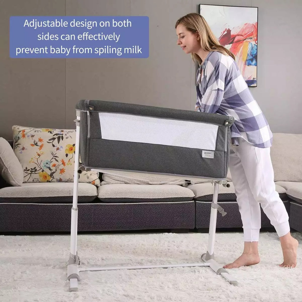 Woman adjusting a baby crib in a living room with text about its adjustable design.