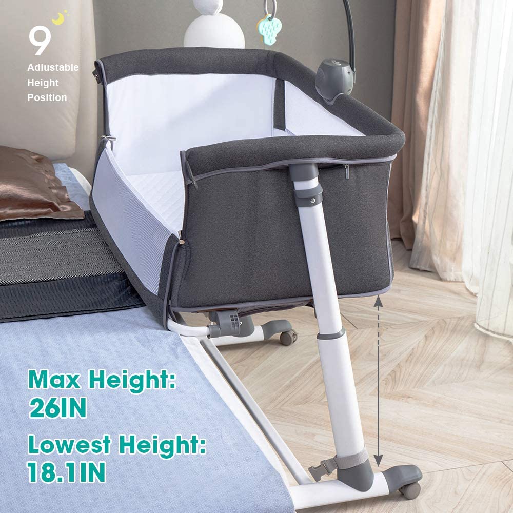 Adjustable height baby crib with height measurement details .