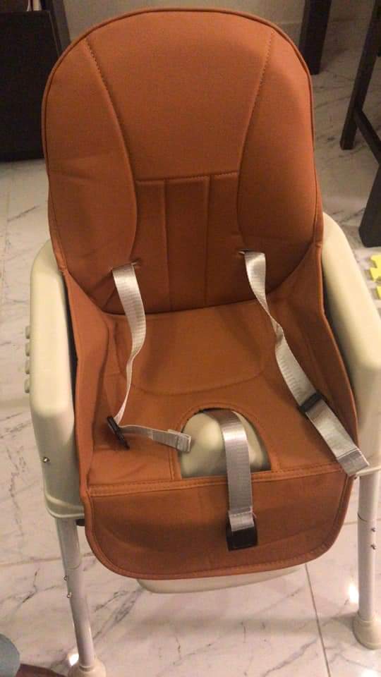 Brown foldable high chair & safety seat .
