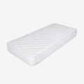A white quilted mattress topper or mattress pad with a diamond-patterned .